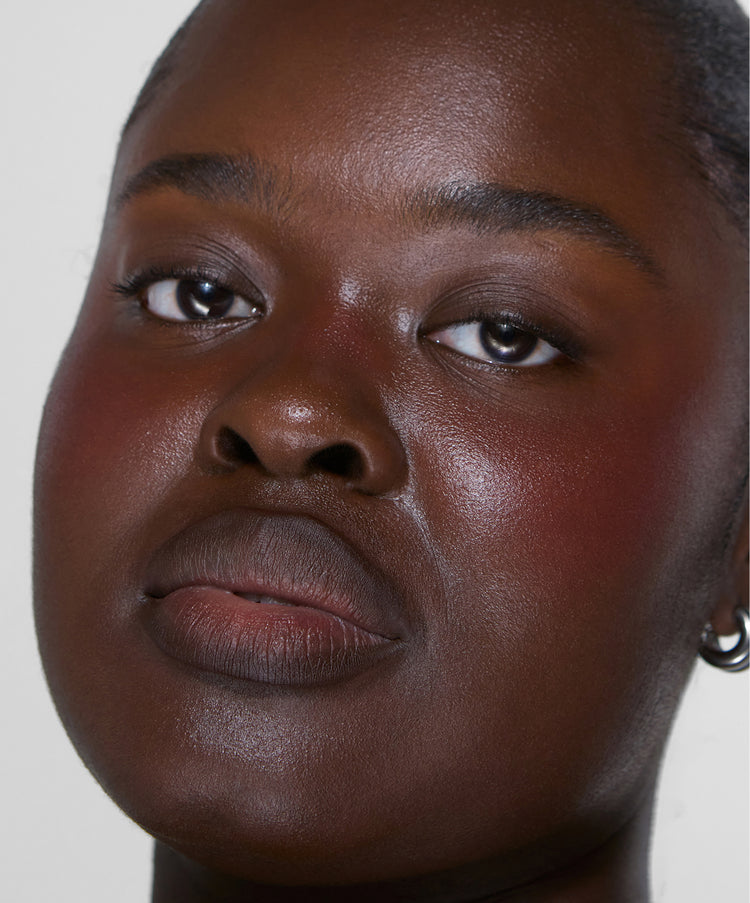Model wears Lip Sculpt in Clove