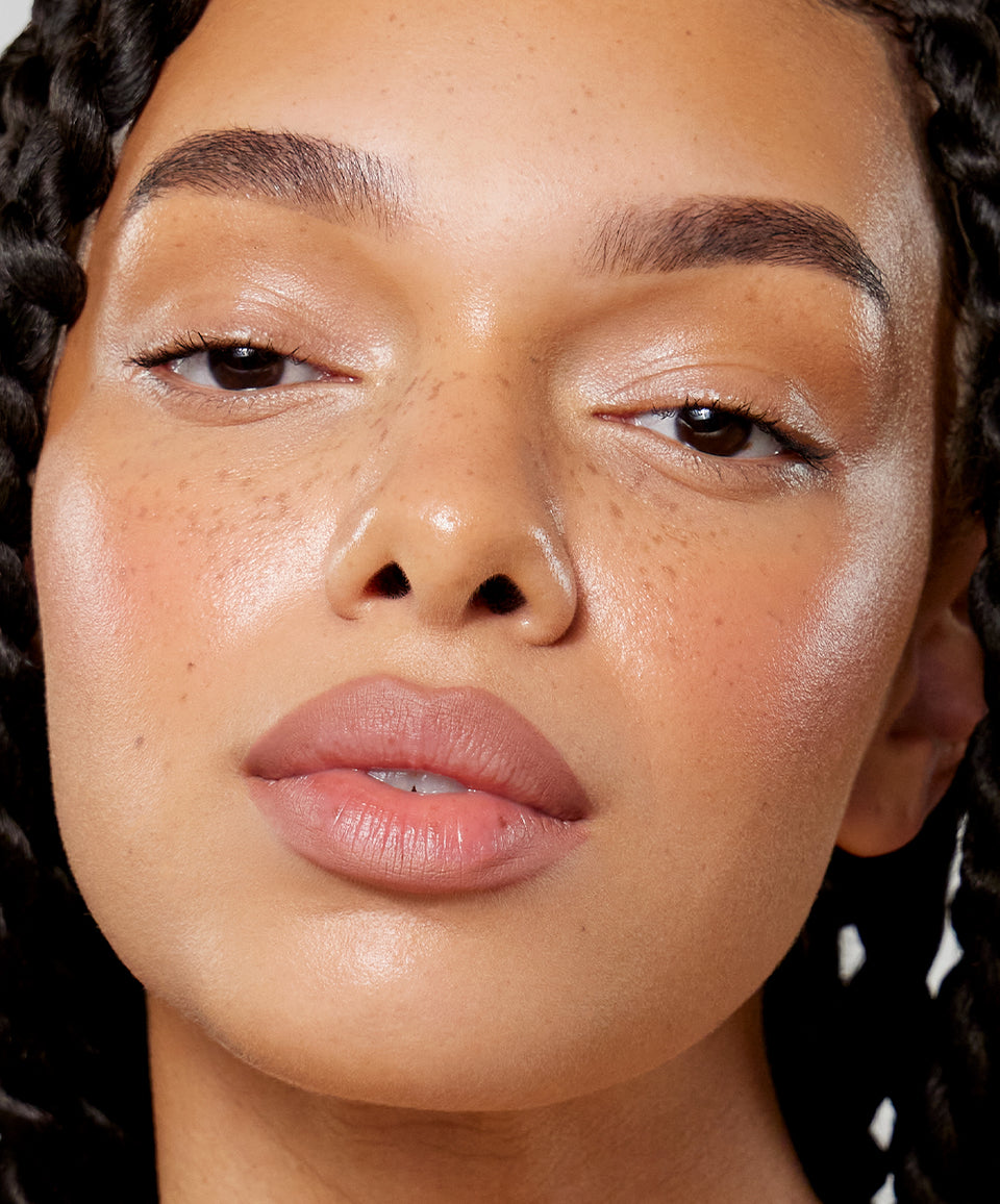| desc: | text: light Gabbi wears Lip Sculpt in Taupe