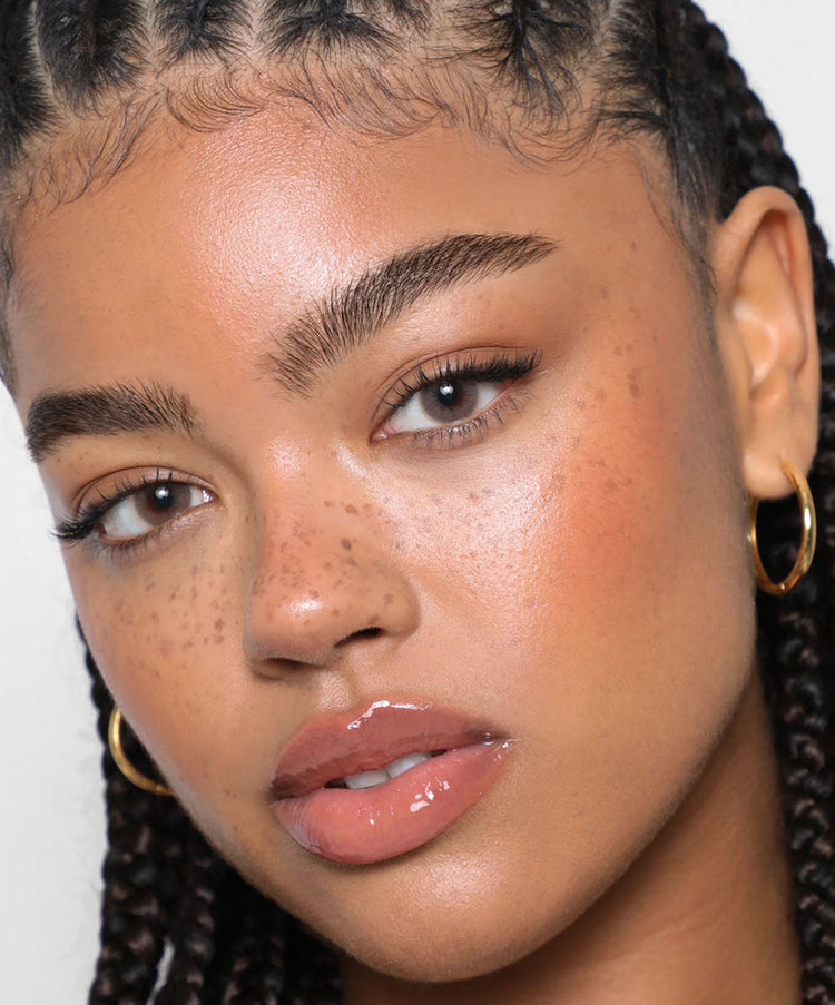Model wears Brow Tint in Deep Brown