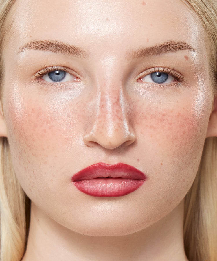 Model wears Lip Sculpt in Red