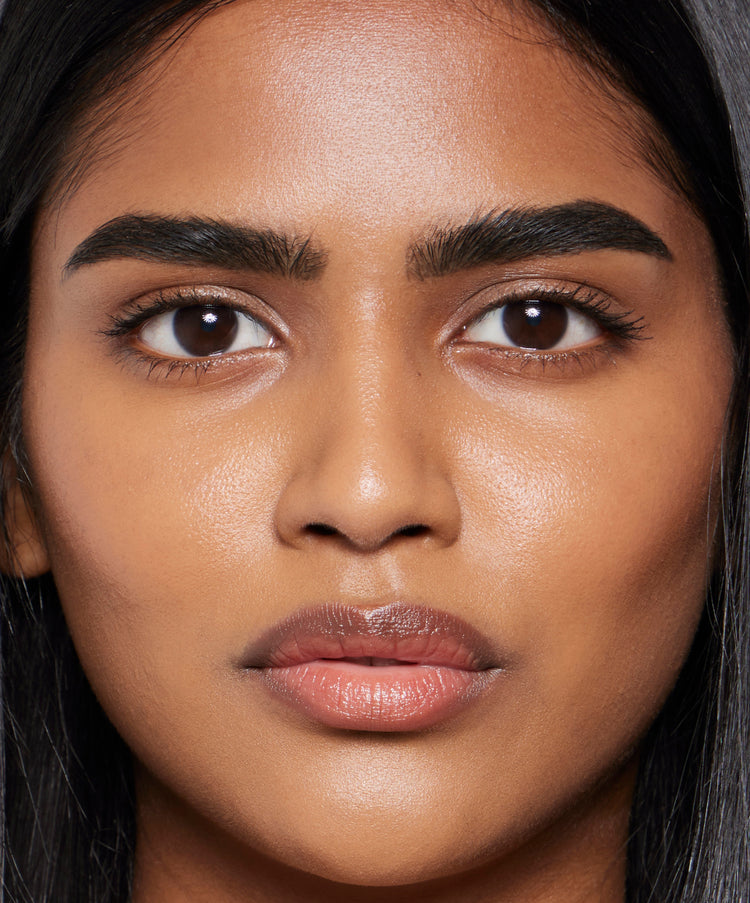 Model wears Brow Pomade in Black