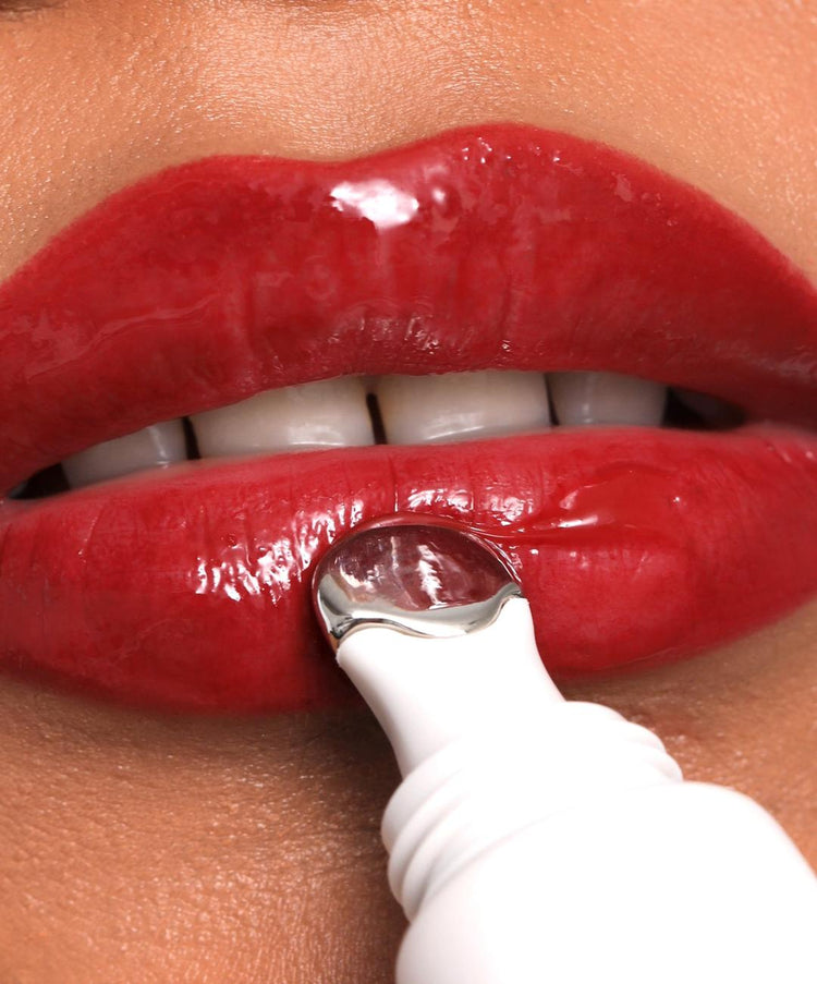 | desc: Lip Gloss in shade Red
